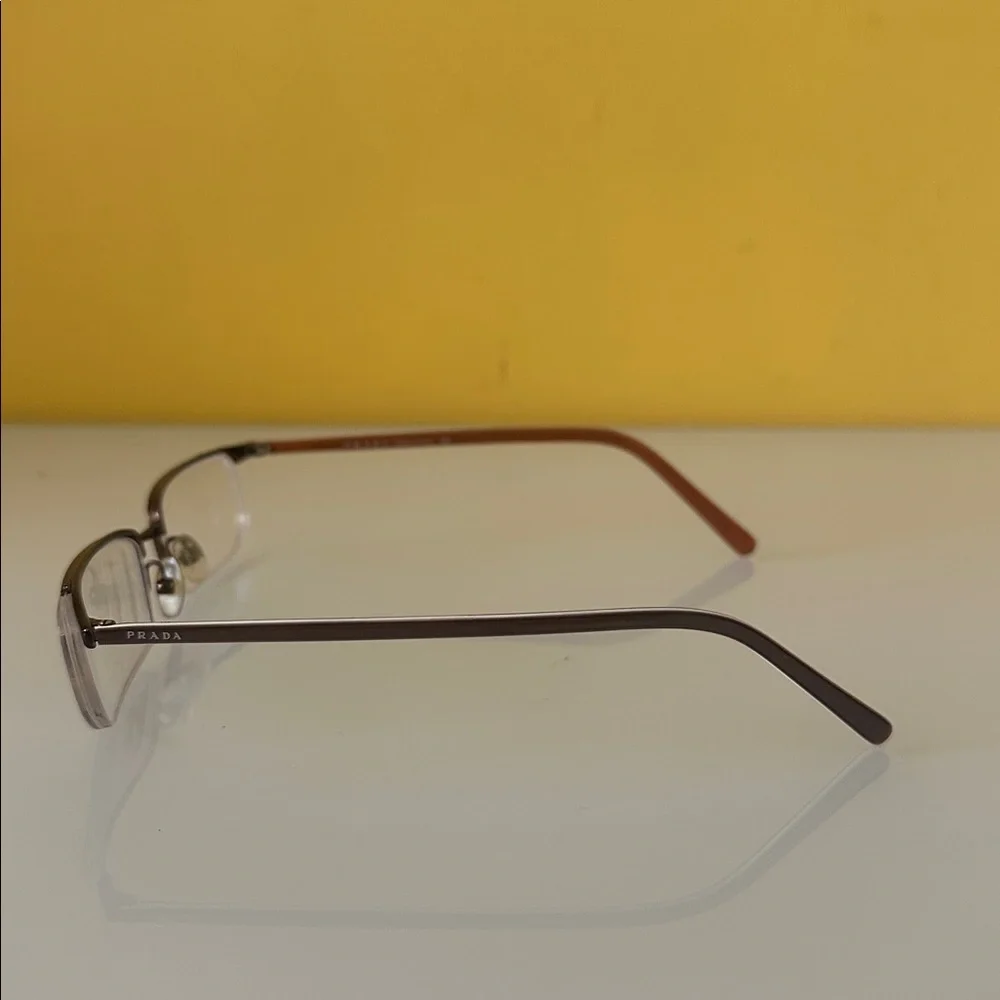 Prada Sleek Bronze Titanium Frameless Rectangular Prescription Glasses Frame